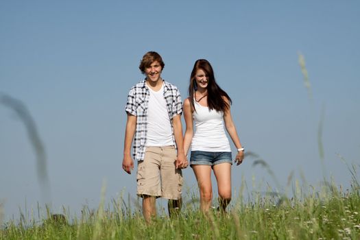 young love couple smiling outdoor in summer having fun