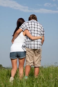 young love couple smiling outdoor in summer having fun