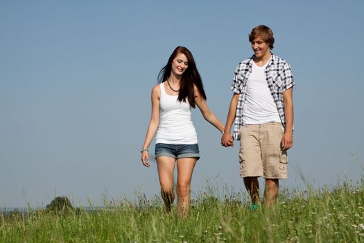 young love couple smiling outdoor in summer having fun