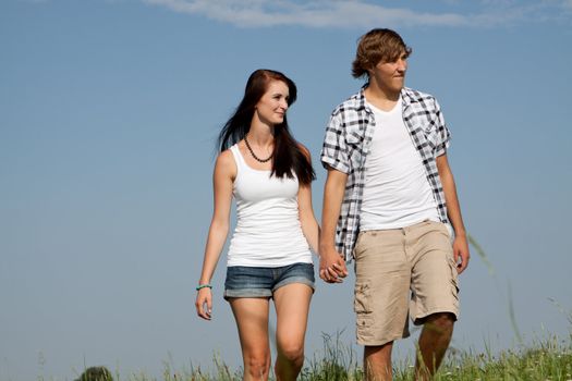 young love couple smiling outdoor in summer having fun