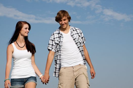 young love couple smiling outdoor in summer having fun