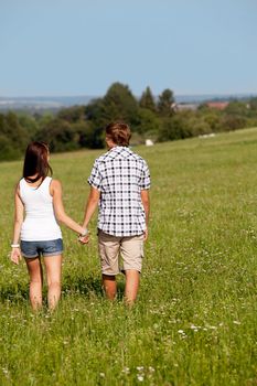 young love couple smiling outdoor in summer having fun