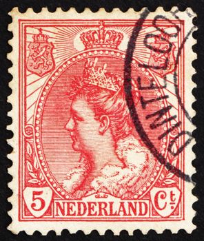 NETHERLANDS - CIRCA 1898: a stamp printed in the Netherlands shows Queen Wilhelmina, circa 1898
