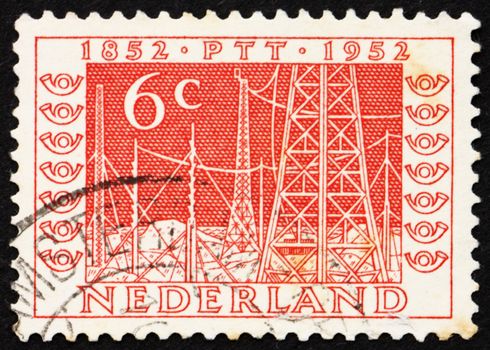 NETHERLANDS - CIRCA 1952: a stamp printed in the Netherlands shows Radio Towers, Centenary of the Telegraph Service, circa 1952