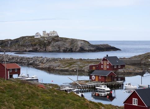 Norwegian rorbu fishing houses and boats on Bjornsund