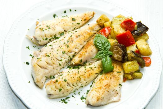 Tasty healthy fish fillet with vegetables