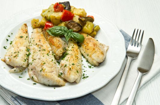 Tasty healthy fish fillet with vegetables