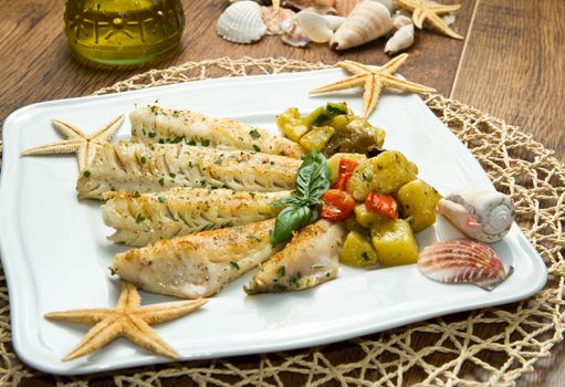 Tasty healthy fish fillet with vegetables