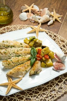 Tasty healthy fish fillet with vegetables