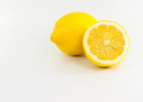 Yellow lemon on white background