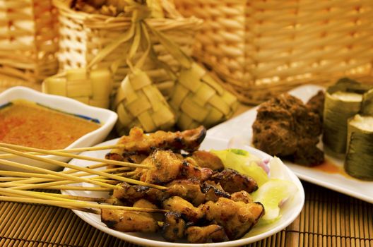 Asian malay Ramadhan foods, satay chicken, rendang, lemang and ketupat