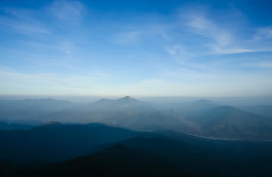 misty early on mountain landscape blue sky cloudy