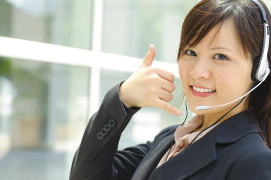Friendly Customer Representative with headset.
