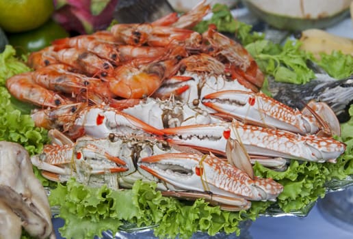 plate with asian seafood shrimps and crab