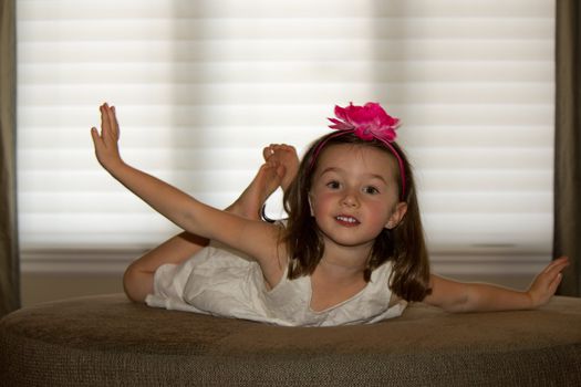 Playful, happy child posing.