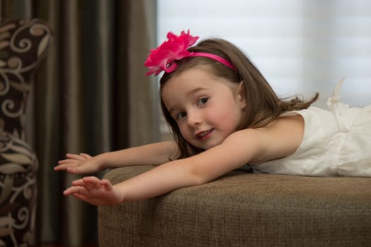 Playful, happy child posing.