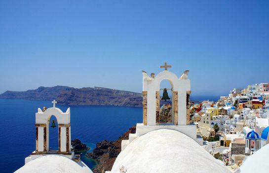 Amazing small white houses of Santorini, summer sunny day