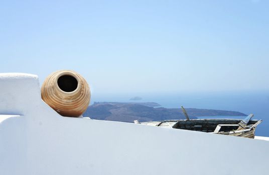 Views of Santorini, composition with old pot          