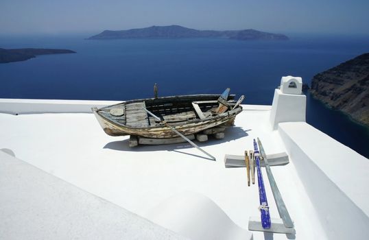 Santorini in details, composition with old ship   