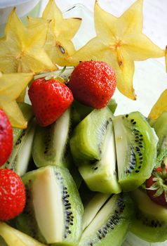 Healthy salad - mix of summer and exotic fruits         

