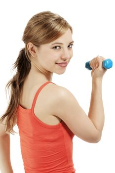 young fitness woman exercise with a dumbbell looking over her shoulder on white background