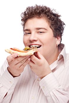 Happy chubby boy eating a slice of pizza, isolated on white