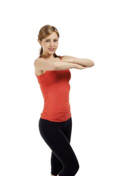 young fitness woman exercising with folded arms on white background
