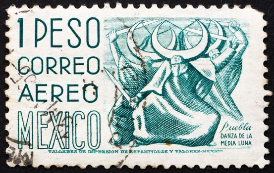 MEXICO - CIRCA 1950: a stamp printed in the Mexico shows Puebla, Dance of the Half Moon, circa 1950