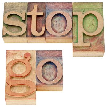 stop and go - isolated words in vintage letterpress wood type