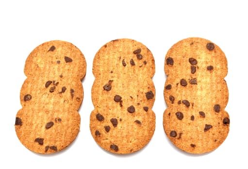 biscuits with chocolate pieces over white background