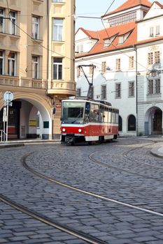 Vintage red cable car on narrow street in Prague,Czech Republic