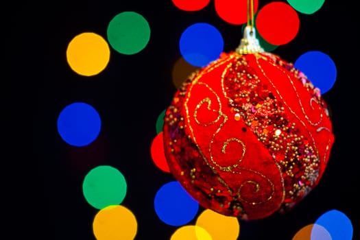 Red Christmas ball with lots of colors light