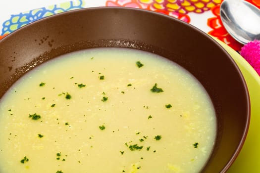 A creamy vegetable soup with parsley