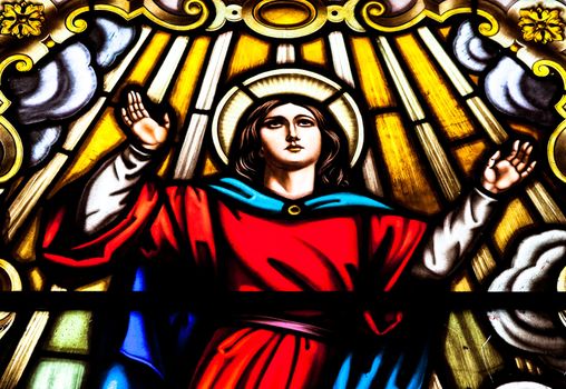 Wonderful ancient stained glass window formed of multiple colors of the Church of Santa  Cruz, Cadiz, Spain