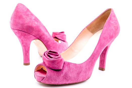 Pair of pink  dress women shoes isolated over white