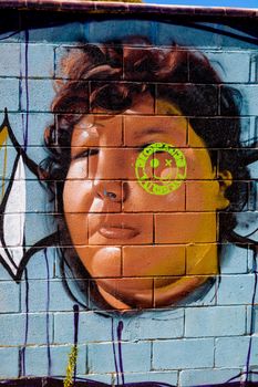 PUERTO REAL, CADIZ, SPAIN-JUL 15: Graffiti of unidentified artist on the first tournament of Graffiti of Puerto Real on Jul 15, 2011, in Puerto Real,  Spain