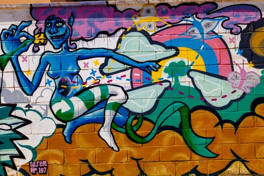 PUERTO REAL, CADIZ, SPAIN-JUL 15: Graffiti of unidentified artist on the first tournament of Graffiti of Puerto Real on Jul 15, 2011, in Puerto Real,  Spain