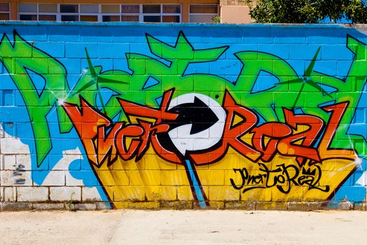 PUERTO REAL, CADIZ, SPAIN-JUL 15: Graffiti of unidentified artist on the first tournament of Graffiti of Puerto Real on Jul 15, 2011, in Puerto Real,  Spain