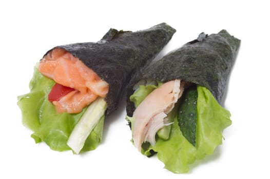 Various kinds of sushi and sashimi. Isolated.