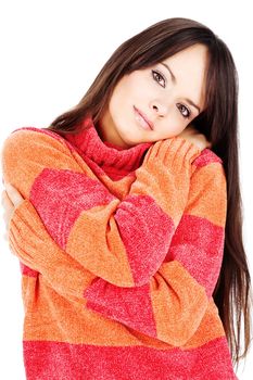 young long hair brunette woman in a red-orange wool sweater, isolated on white