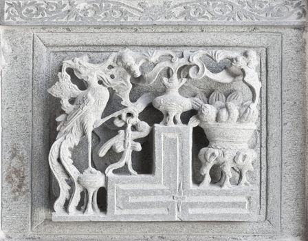 stone carving, the carving is a beautiful taiwan art style.