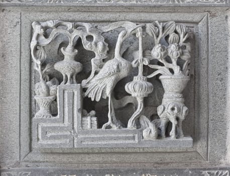stone carving, the carving is a beautiful taiwan art style.