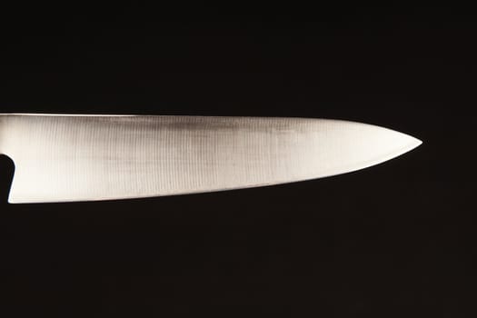 Blade of carving knife - on black background