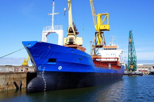 The cargo ship costs at a mooring