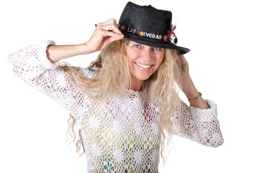 mature hippie woman with las vegas hat smiling