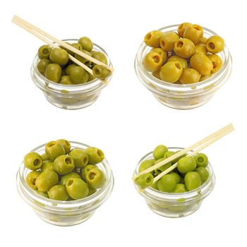 Set green olives in a bowl on a white background