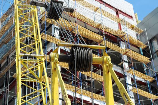 Building - the crane near the under construction house. Taken from the bottom up