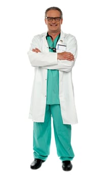 Medical expert standing with arms crossed, full length portrait