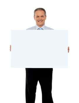 Experienced male representative with blank white ad board
