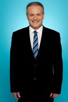 Handsome aged businessman isolated over gradient background